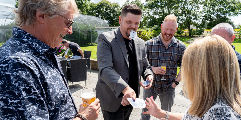 Mark Roberts performing magic in Liverpool